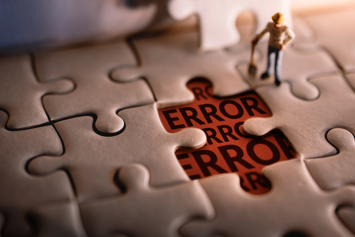 Miniature Worker Finding an Error